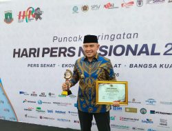 Bupati Tanah Laut Terima Penghargaan SIWO Award
