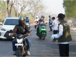 Lindungi Warga dari Paparan Asap Karhutla, Pemkab Tanah Bumbu Bagikan Masker Gratis